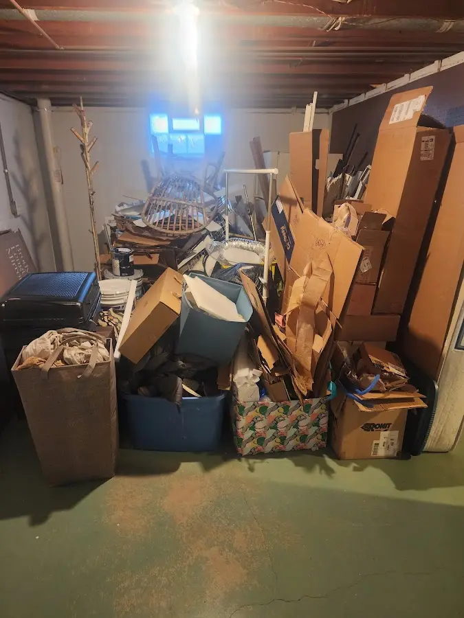 Roll-off dumpster container at job site for Yard Waste Dumpster Rental in Clayton